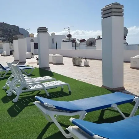 Side פוארטו דה מוגן